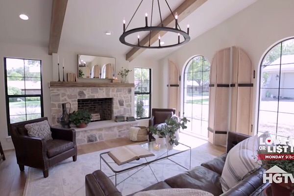 Stone Fireplace, Wood Beams and Modern Light Fixture